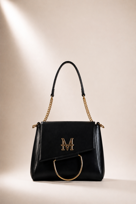 LEUCOTHEA borsa trasformabile MOR/PHE color nero con patta frontale rimovibile, dettagli in oro e logo rotabile