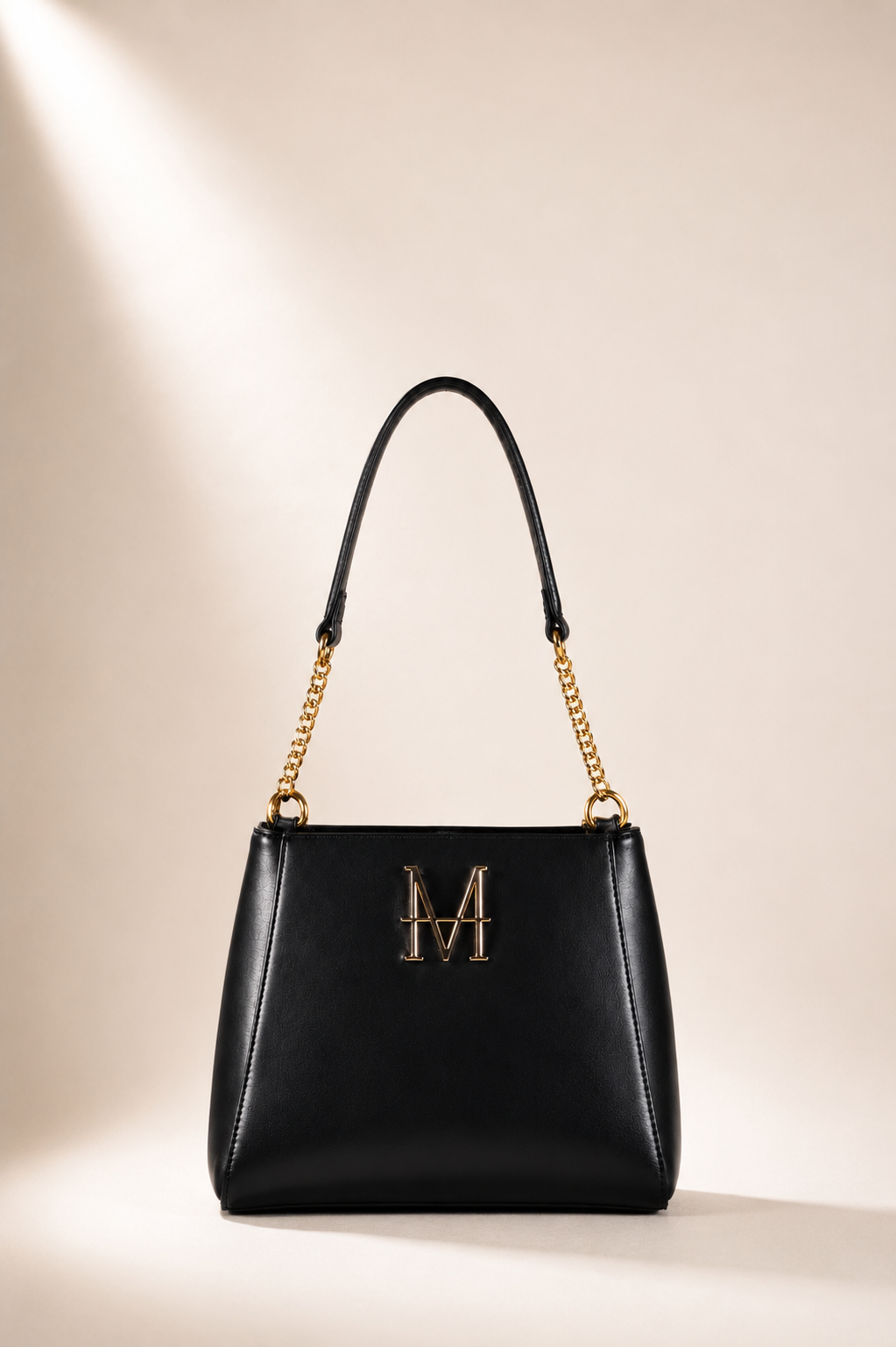 LEUCOTHEA borsa trasformabile MOR/PHE color nero con dettagli in oro