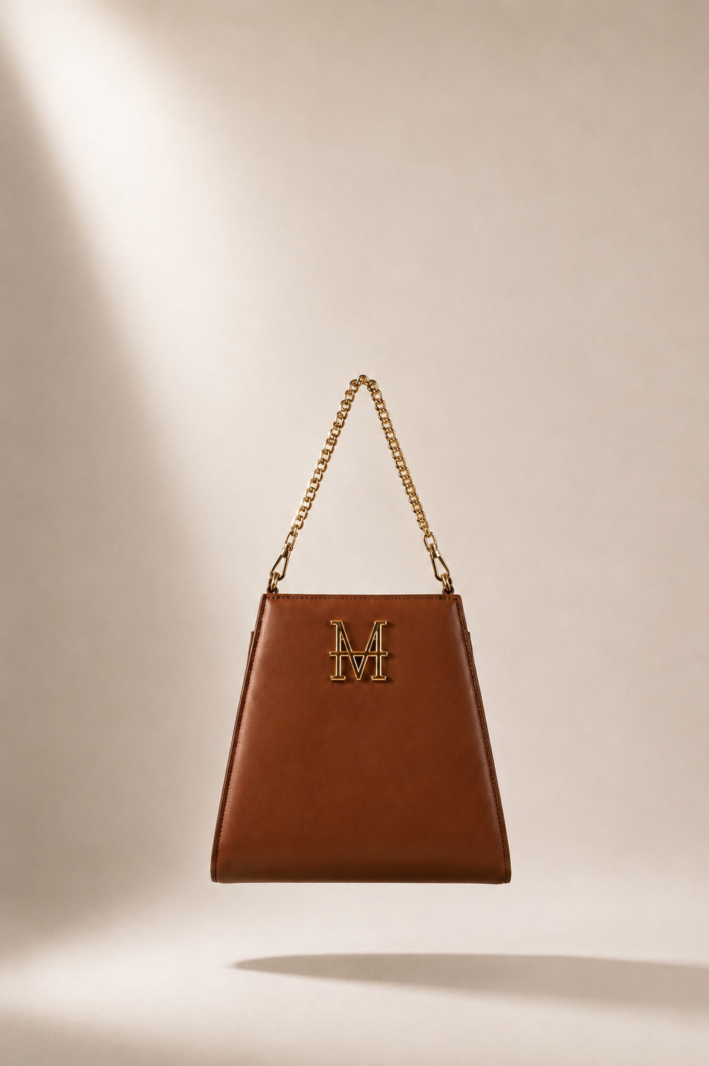 CLYTIE pochette borsa MOR/PHE color cognac con dettagli in oro e logo rotabile