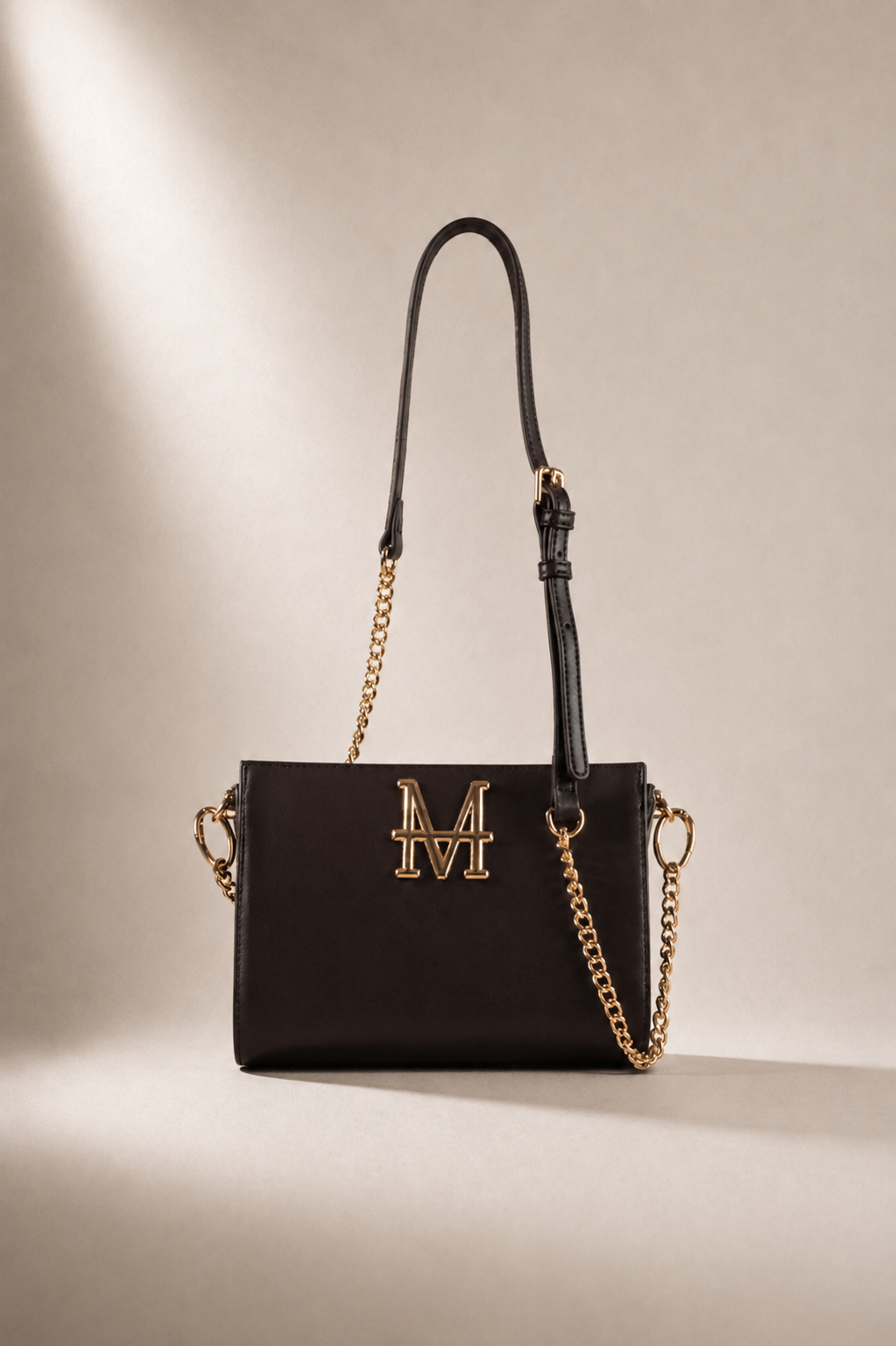 SYRINX pochette MOR/PHE color testa di moro con dettagli in oro, logo rotabile e tracolla